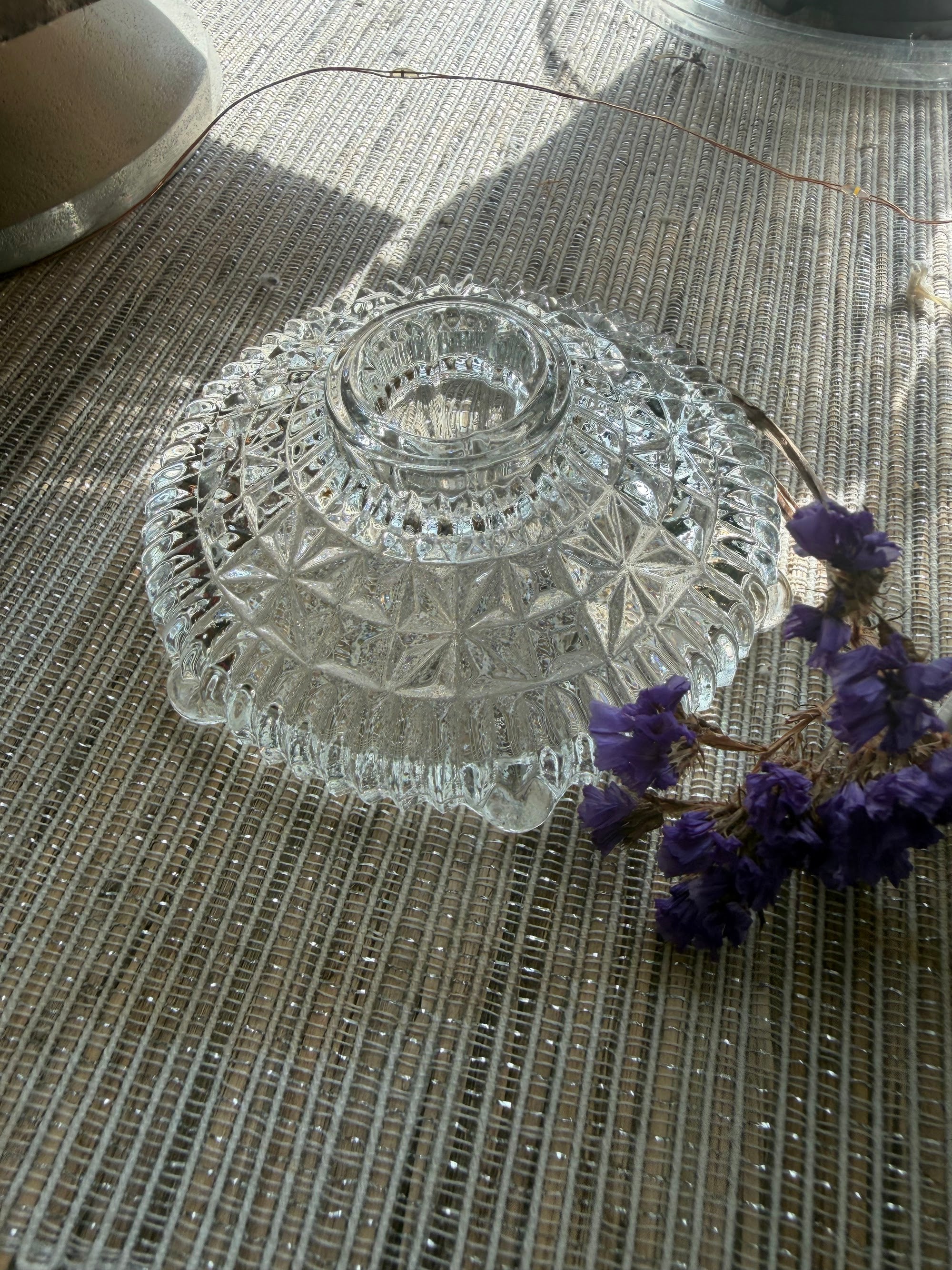 Pressed glass candle holder with dried purple flowers styling
