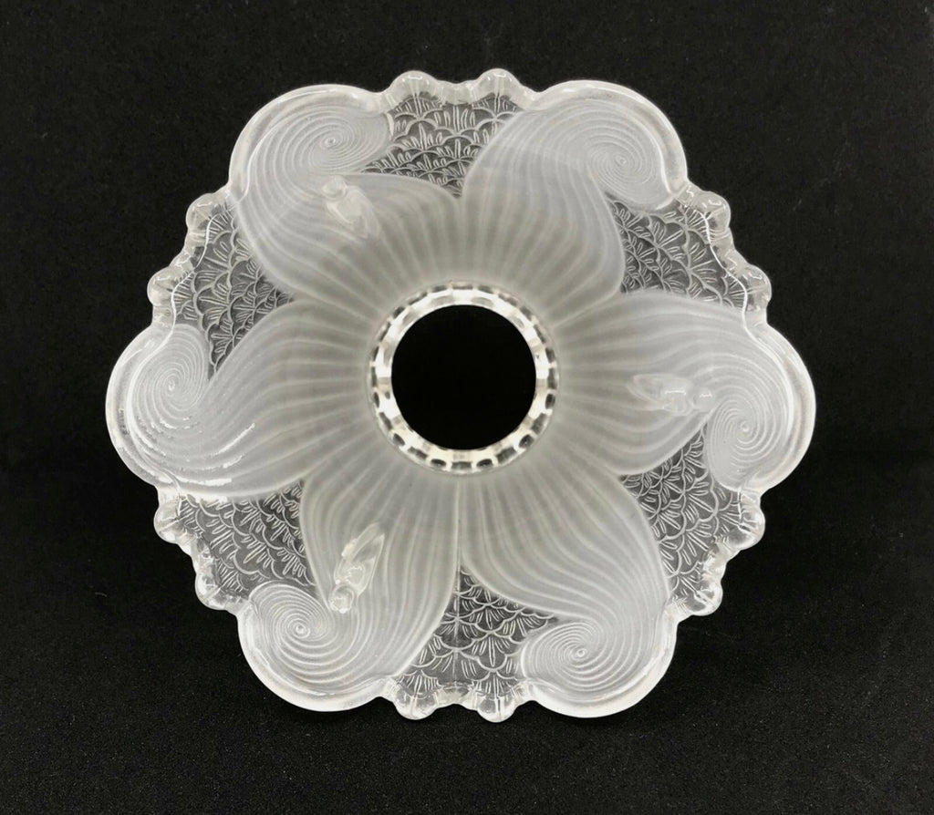 Top-down view of frosted swirl glass shade showing pinwheel pattern