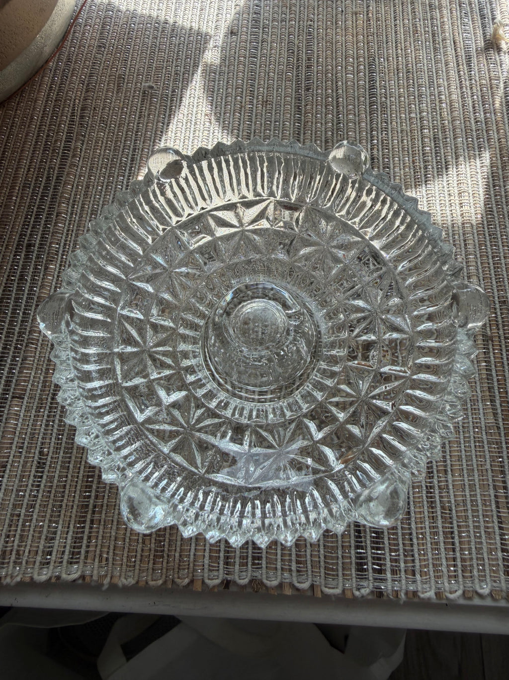 Top-down view showing radiating star pattern and sawtooth rim