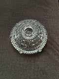 Clear pressed glass low candle holder with star and fan pattern