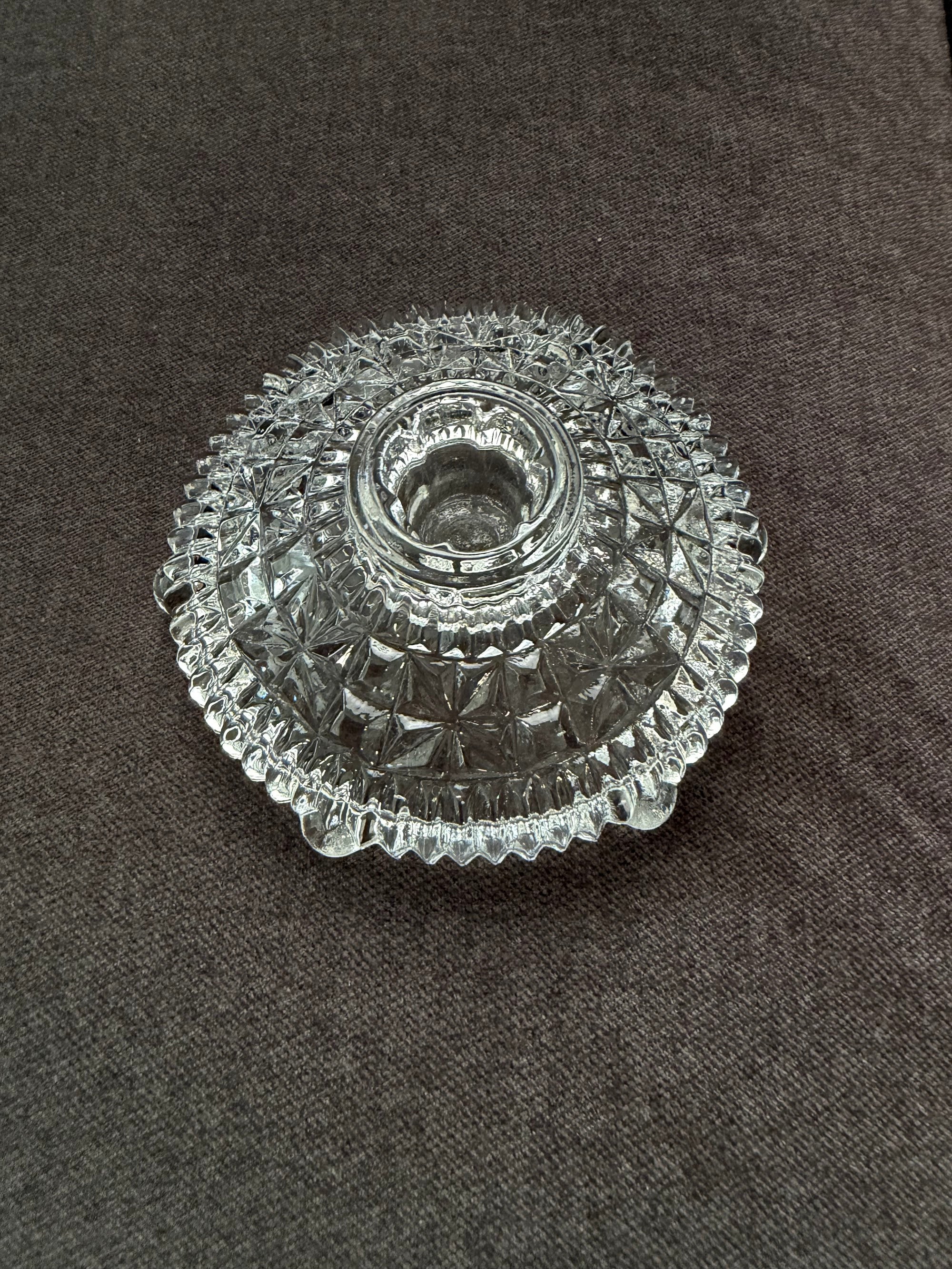 Clear pressed glass low candle holder with star and fan pattern