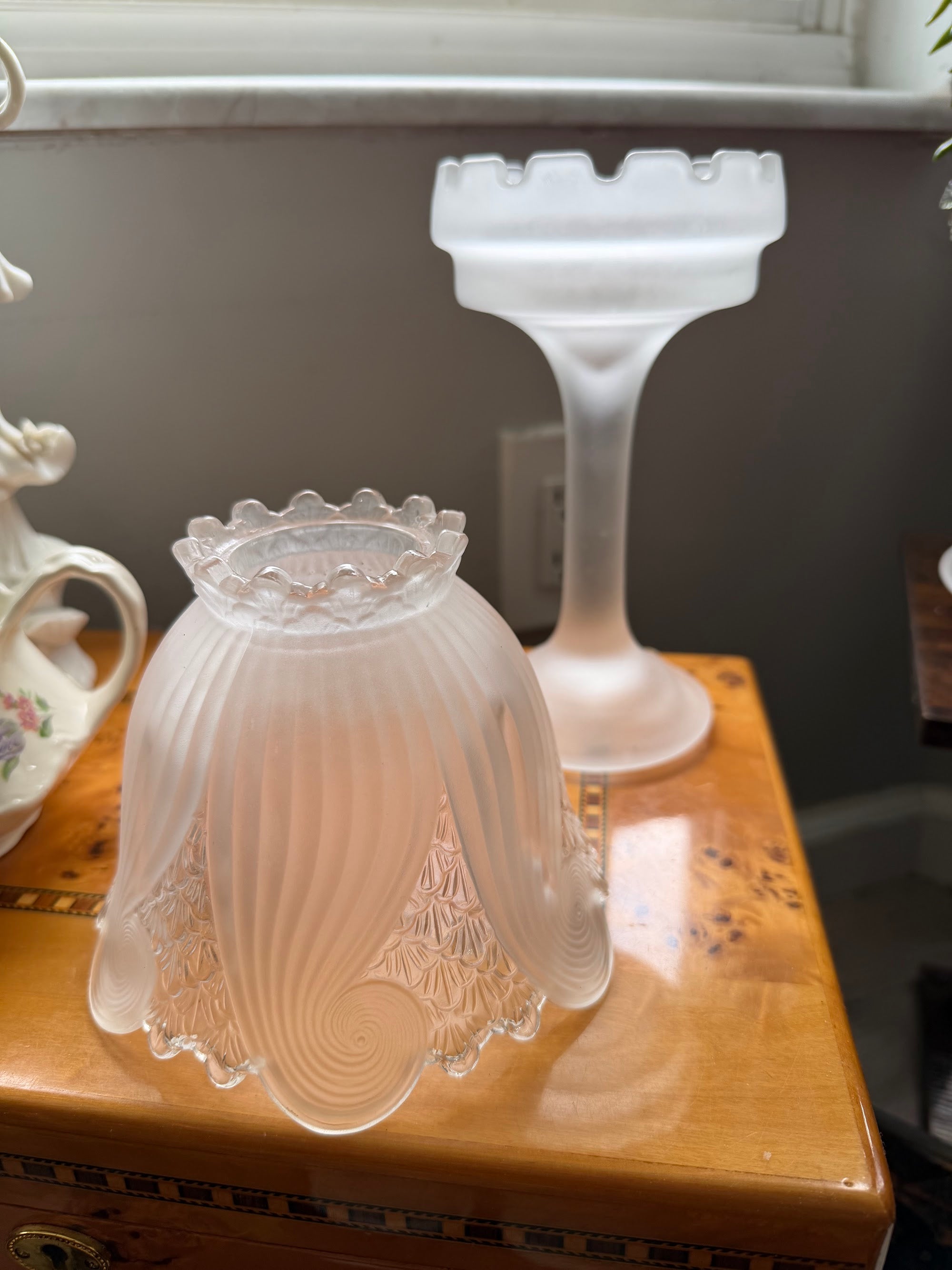 Two-piece candle lamp with shade removed showing crown-shaped pedestal top