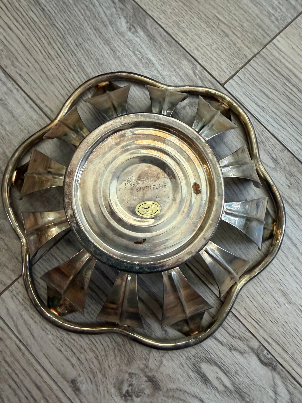 Underside of lotus bowl showing scalloped petal edges