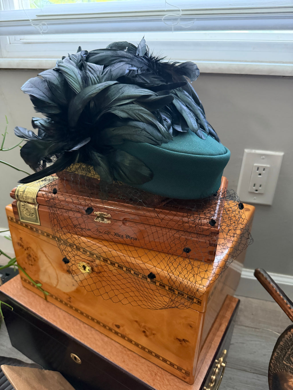 Vintage Green Hat with Birdcage Veil and Feather Accents