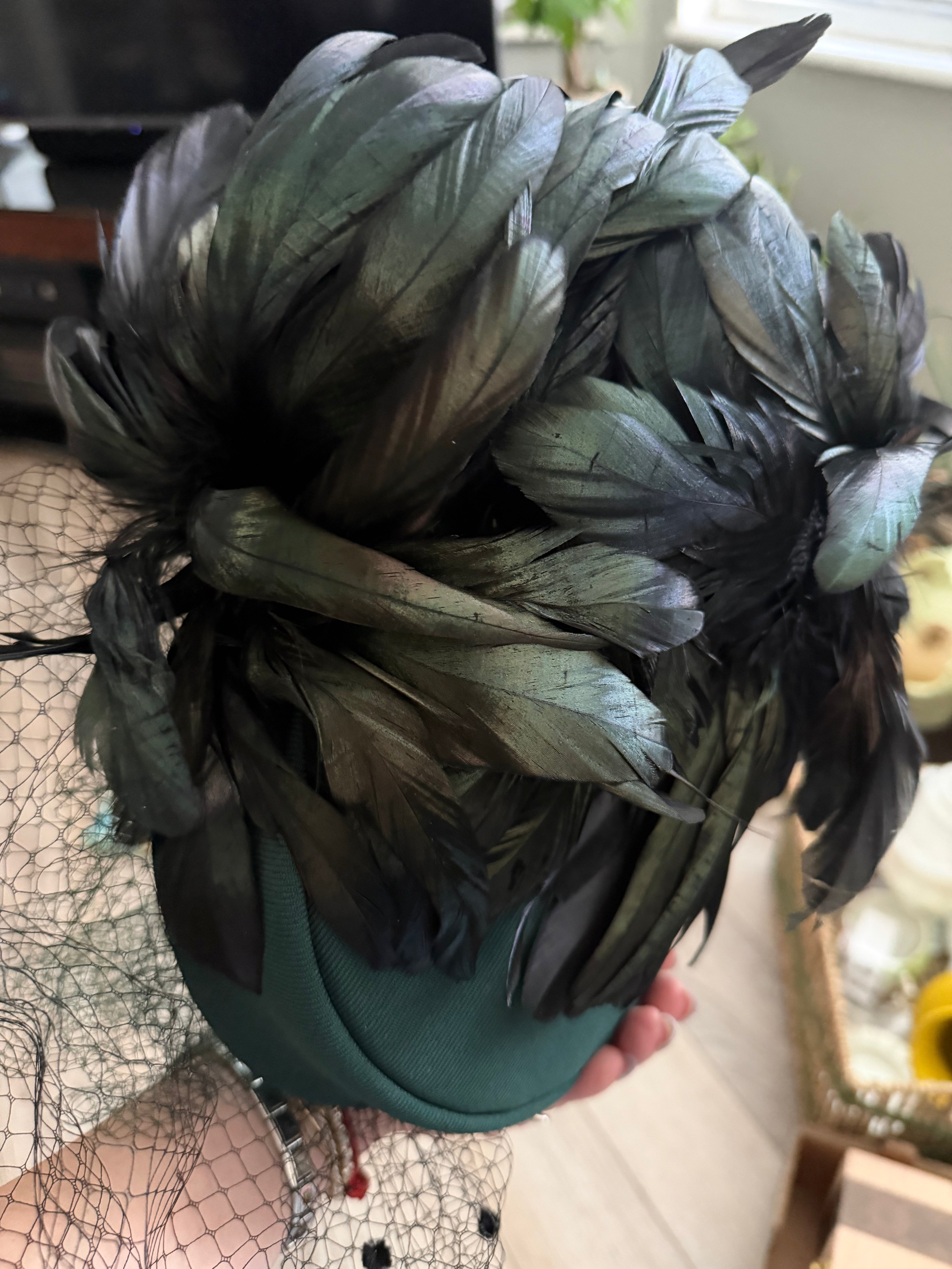 Vintage Green Hat with Birdcage Veil and Feather Accents