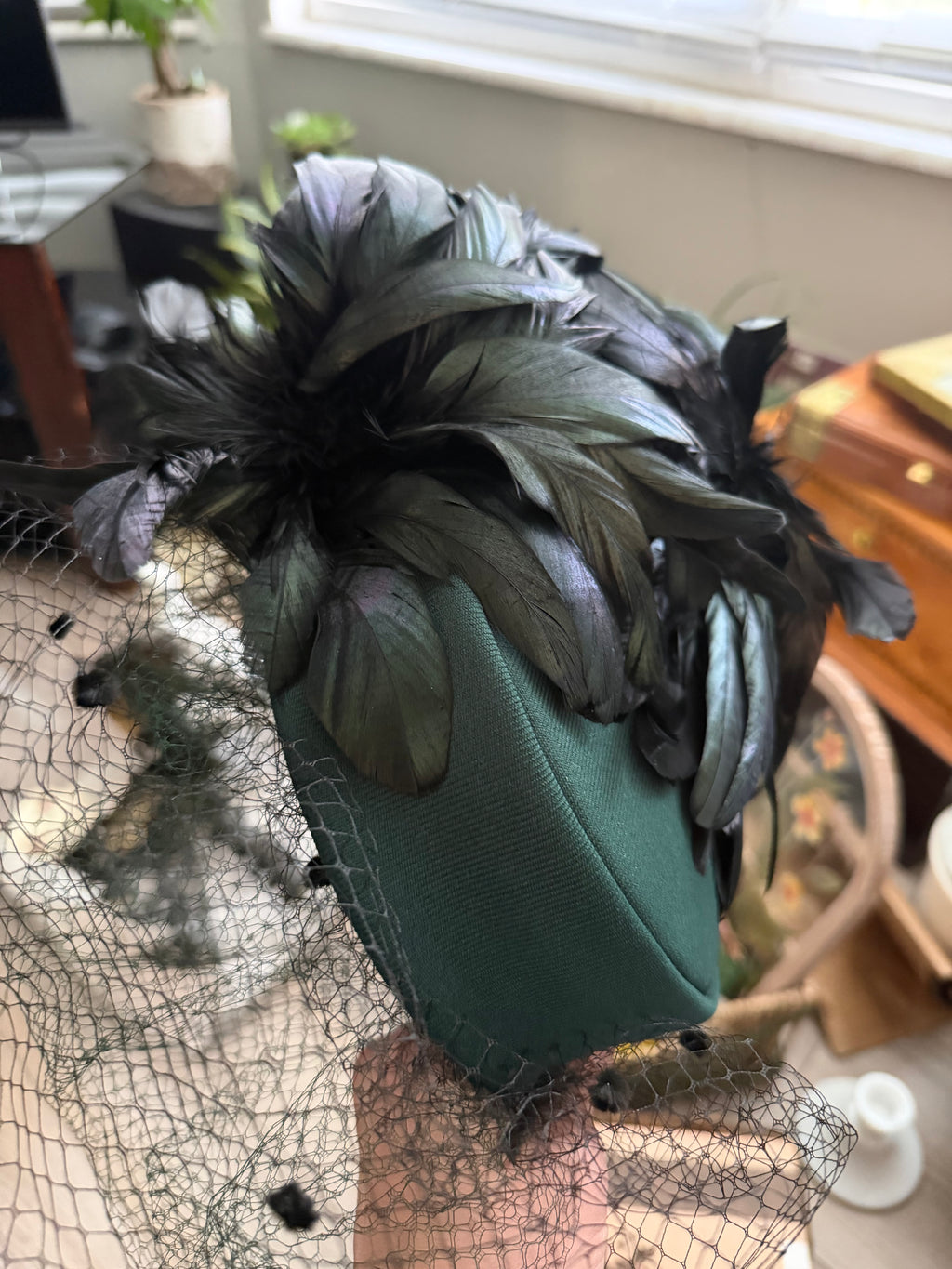 Vintage Green Hat with Birdcage Veil and Feather Accents